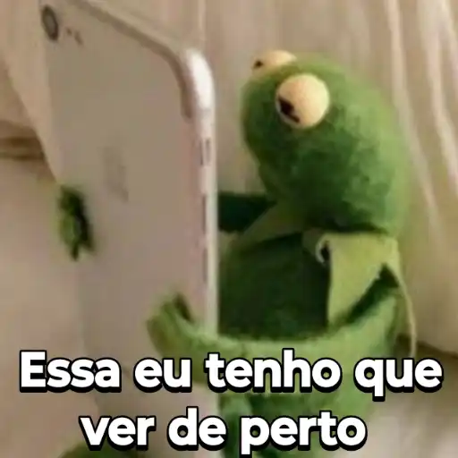 Figurinha: Caco, o Sapo olhando celular