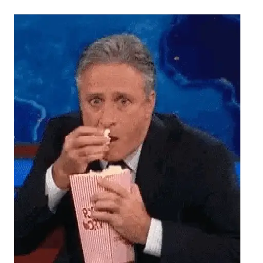 Figurinha: Jon Stewart Comendo Pipoca