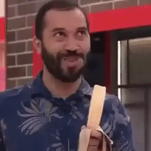 Figurinha: Homem comendo banana de forma engraçada