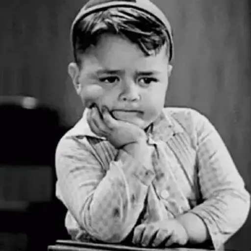 Figurinha: Menino triste com a mão no queixo