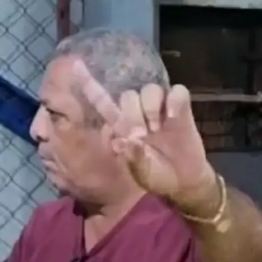 Figurinha: Homem faz sinal de positivo e negativo