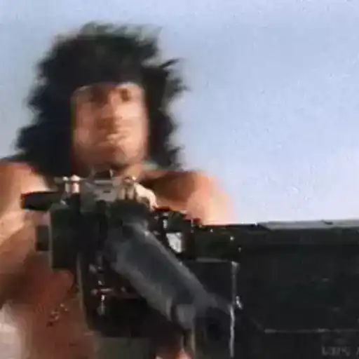 Figurinha: Rambo atirando com metralhadora