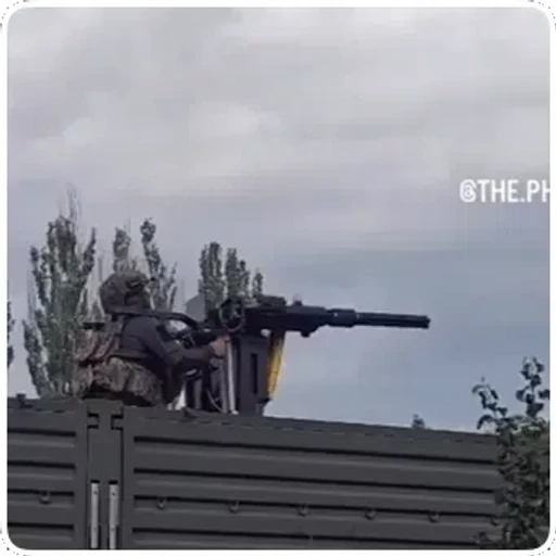 Figurinha: Soldado operando metralhadora