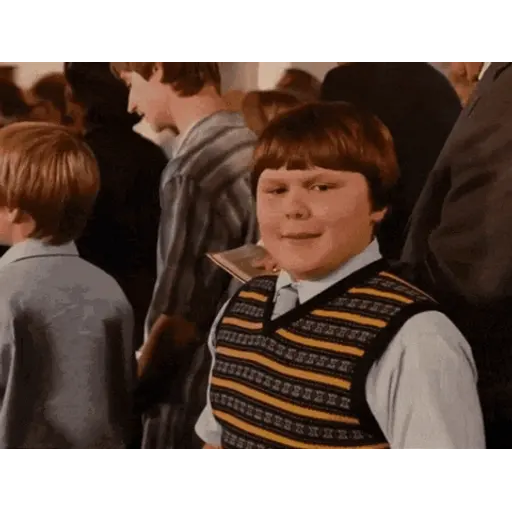 Figurinha: Dudley Dursley acenando