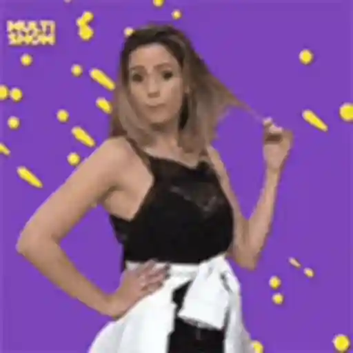Figurinha: Mulher faz pose e dança