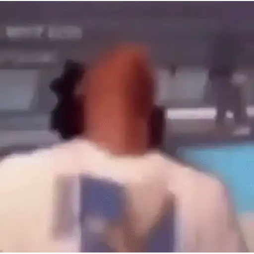 Figurinha: Homem com fones de ouvido dançando