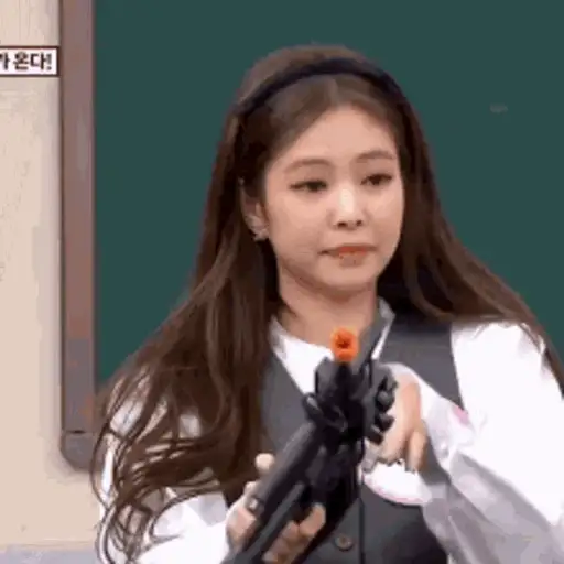 Figurinha: Jennie com arma de brinquedo