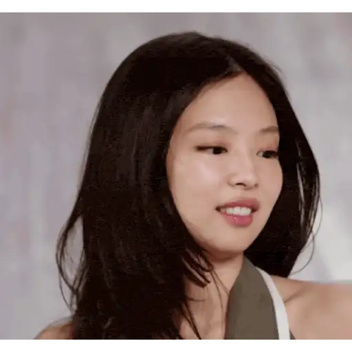 Figurinha: Jennie sorrindo e piscando