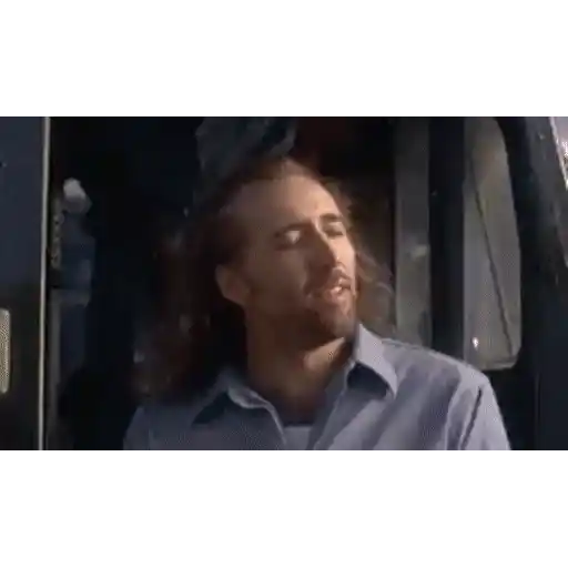 Figurinha: Nicolas Cage no espaço