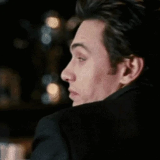 Figurinha: Harry Osborn olhando para trás