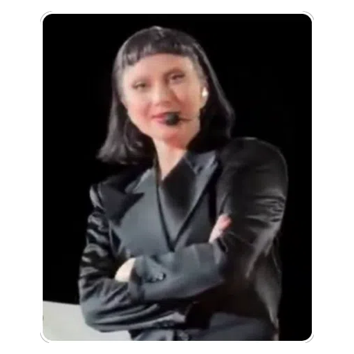 Figurinha: Lady Gaga cantando com microfone