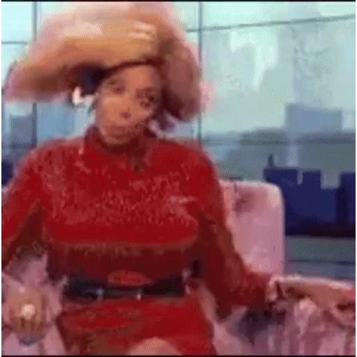 Figurinha: Wendy Williams balançando o cabelo