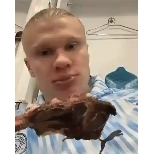 Figurinha: Haaland comendo carne