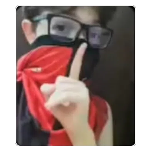 Figurinha: Jovem mascarado fazendo sinal de silênci