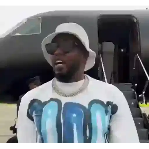 Figurinha: Sean Combs no jatinho